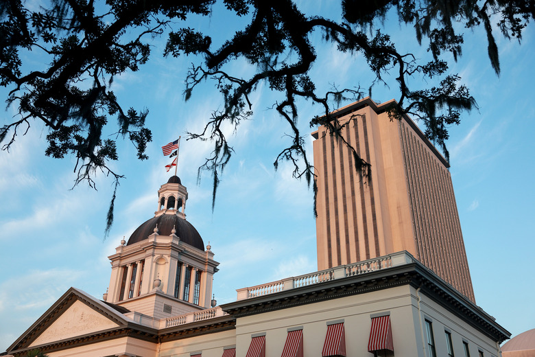 TALLAHASSEE, FLORIDA - JULY 26: The Florida Historic Capitol sits near the 22-story New Capitol building, which together are part of the Capitol Complex on July 26, 2023 in Tallahassee, Florida. Tallahassee became the state's new capital city in 1824. Currently, the Florida Capitol Complex serves as the state government's headquarters. The Capitol, a twenty-two-story structure, houses the Florida government's Executive and Legislative arms. The Capitol Complex also includes the Historic Capitol and Knott Building and two five-story office buildings for the House of Representatives and Senate.  (Photo by Joe Raedle/Getty Images)