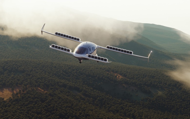 A flying vehicle with green mountains in the background.