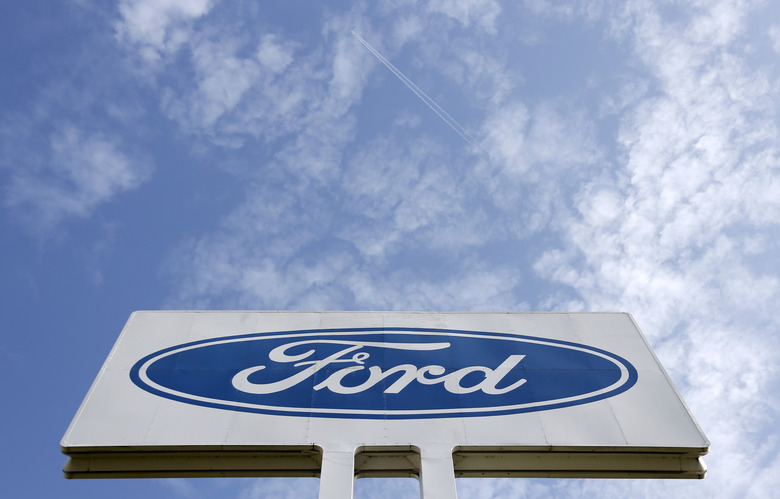 The logo of Ford Motor Co is seen at the company's assembly plant after an emergency meeting with the plant management in Genk October 24, 2012. Ford Motor Co announced to unions on Wednesday that it will close the factory employing 4,300 workers in the Belgian town of Genk, as it tries to stem losses in Europe and match capacity to tumbling demand. REUTERS/Francois Lenoir (BELGIUM - Tags: TRANSPORT BUSINESS EMPLOYMENT LOGO)