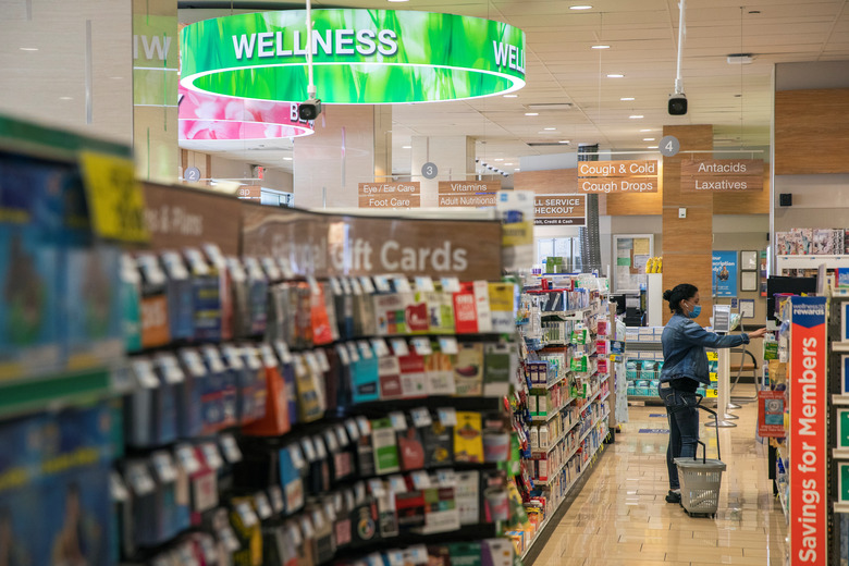 A woman shops inside of a Rite Aid store underneath a DeepCam security camera in New York City, New York, U.S., June 25, 2020. Picture taken June 25, 2020. REUTERS/Lucas Jackson
