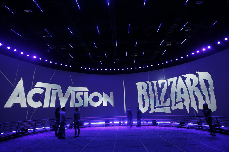 FILE - The Activision Blizzard Booth during the Electronic Entertainment Expo in Los Angeles, June 13, 2013. The Federal Trade Commission said Thursday, Dec. 8, 2022, that it is suing to block Microsoft’s planned $69 billion takeover of video game company Activision Blizzard, saying it could suppress competitors to its Xbox game consoles and its growing games subscription business. (AP Photo/Jae C. Hong, File)