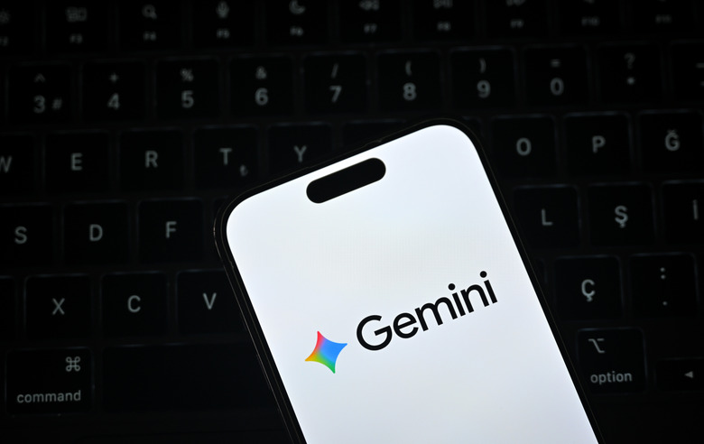 ANKARA, TURKIYE - OCTOBER 24: In this photo illustration the Gemini logo is displayed on a phone screen above a keyboard in Ankara, Turkiye, on October 24, 2025. (Photo Illustration by Hakan Nural/Anadolu via Getty Images)