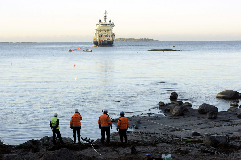 FILE PHOTO: The C-Lion1 submarine telecommunications cable is being laid to the bottom of the Baltic Sea by cable ship Ile de Brehat on the shore of Helsinki, Finland on October 12, 2015. Lehtikuva/Heikki Saukkomaa/via REUTERS/File Photo