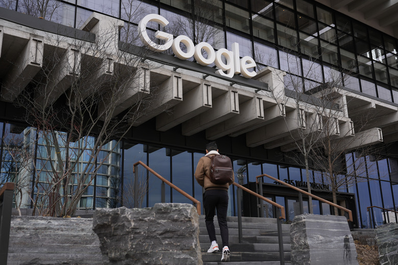 People arrive to the recently opened Google building in New York, Monday, Feb. 26, 2024. (AP Photo/Seth Wenig)