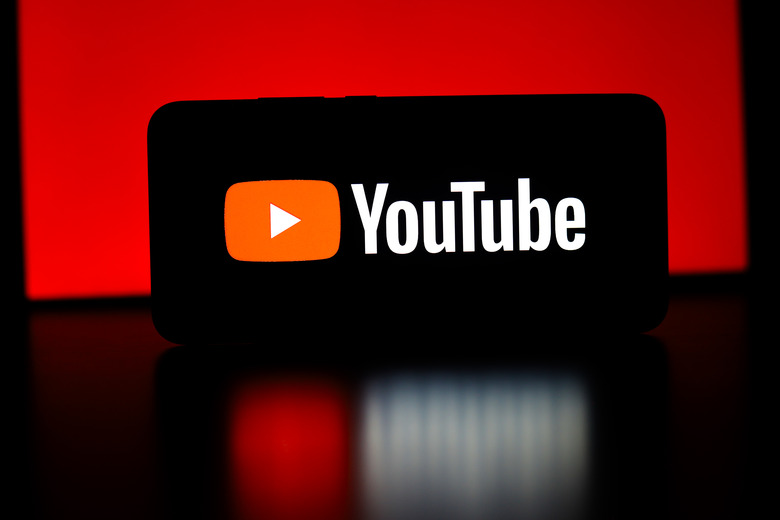 The YouTube logo appears on a smartphone screen in this photo illustration in Ontario, Canada, on February 16, 2026. (Photo Illustration by Thomas IllustrationFuller/NurPhoto via Getty Images)