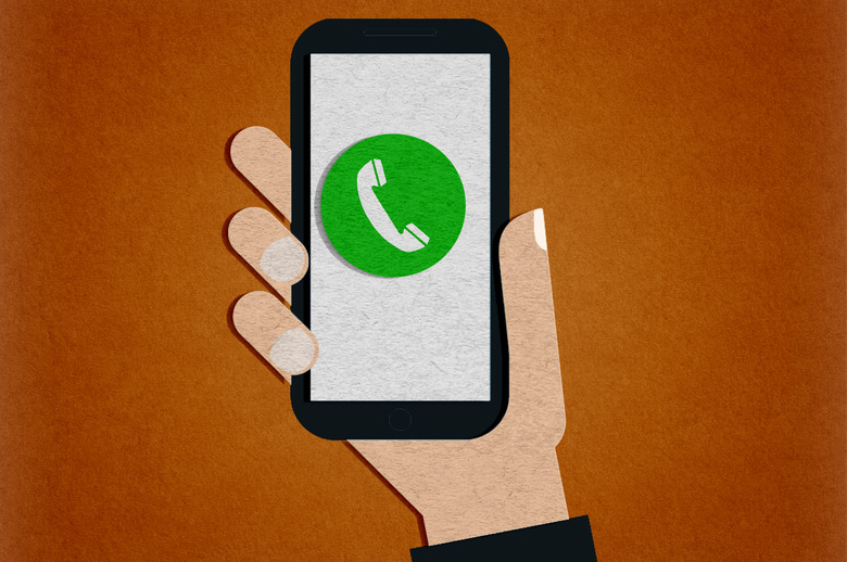 hand holding smartphone with phoning call