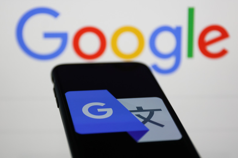 Google Translate icon displayed on a phone screen and Google logo displayed in the background are seen in this illustration photo taken in Krakow, Poland on February 8, 2023. (Photo by Jakub Porzycki/NurPhoto via Getty Images)