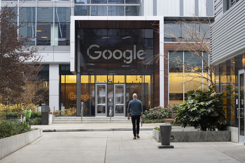 Seattle, WA, USA - Dec 21, 2023: A Googler walks back to Google's South Lake Union office in Seattle, Washington.