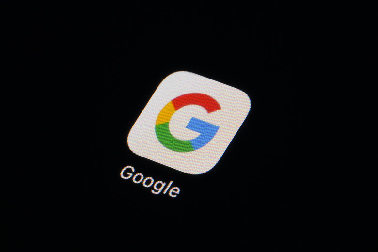 FILE - The Google app icon is seen on a smartphone, Tuesday, Feb. 28, 2023, in Marple Township, Pa. Google agreed Thursday, Dec. 28, to settle a $5 billion privacy lawsuit claiming that it continued spying on people who used the âincognitoâ mode in its Chrome browser â along with similar âprivate browsingâ modes in other browsers â to track their internet use. (AP Photo/Matt Slocum, File)