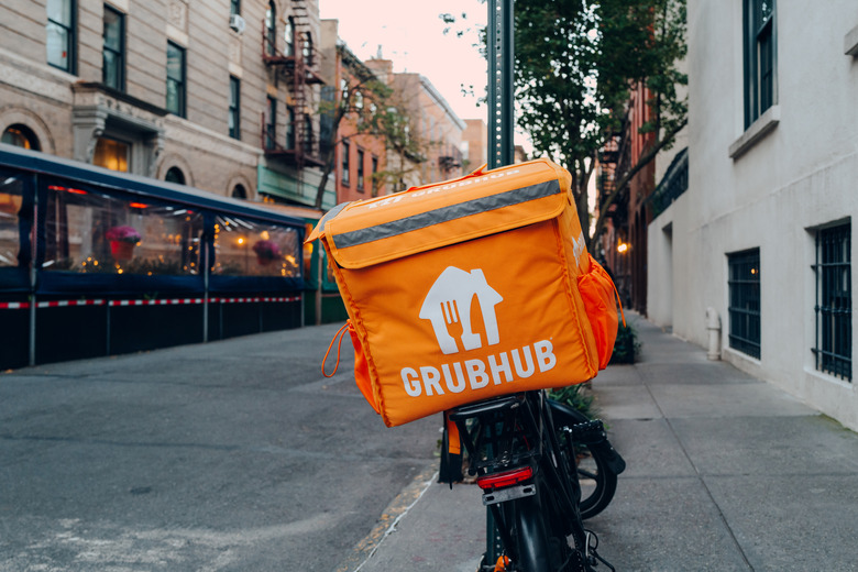 New York, USA - November 21, 2022: Grubhub bag on a delivery bike on a street in NYC. Grubhub online food order and delivery has been a subsidiary of the Dutch company Just Eat Takeaway since 2021.