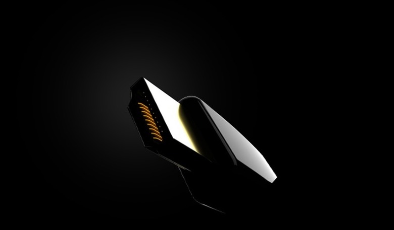 An HDMI connector dimly lit against a dark background