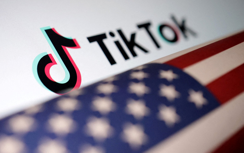 FILE PHOTO: U.S. flag is placed on a TikTok logo in this illustration taken March 20, 2024. REUTERS/Dado Ruvic/Illustration/File Photo
