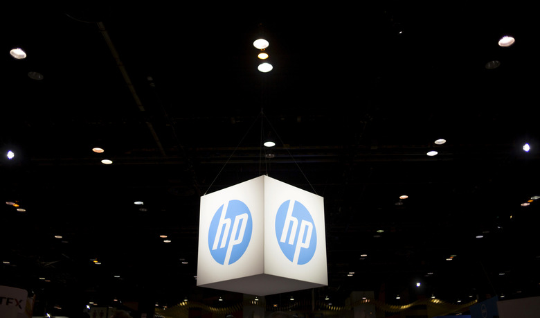 The Hewlett-Packard (HP) logo is seen as part of a display at the Microsoft Ignite technology conference in Chicago, Illinois, May 4, 2015. REUTERS/Jim Young/File Photo         GLOBAL BUSINESS WEEK AHEAD - SEARCH 