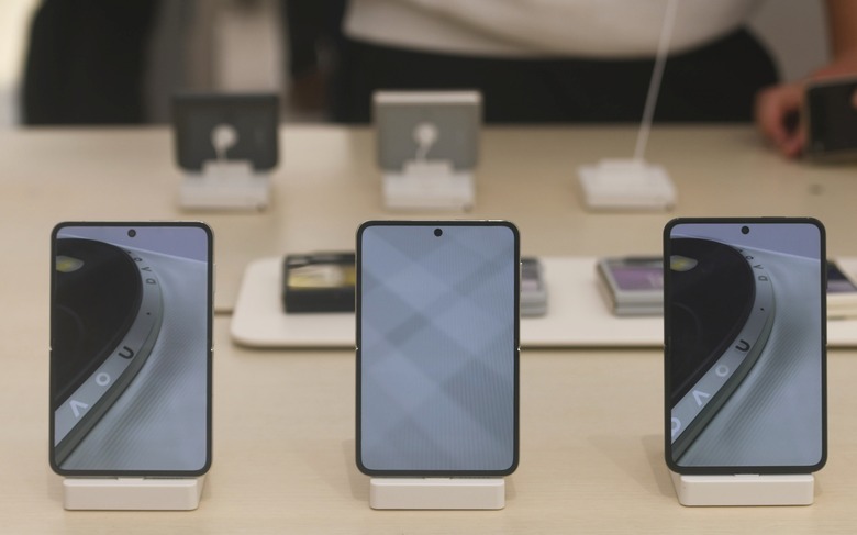 SHANGHAI, CHINA - MARCH 20: Huawei Pura X smartphones, the first mobile device equipped with HarmonyOS 5, are on display at a Huawei flagship store on March 20, 2025 in Shanghai, China. It is currently up for pre-booking in China with delivery of the phone set to begin on March 21. (Photo by Long Wei/VCG via Getty Images)