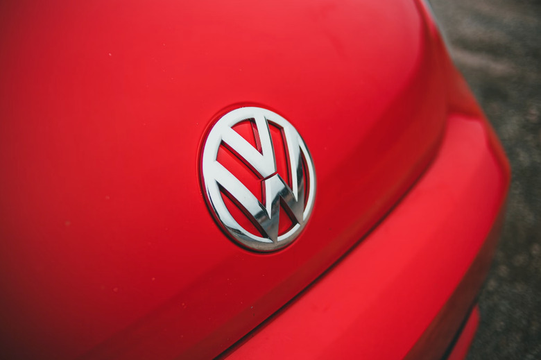 A logo on a red car.