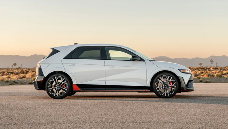 A car in the desert. 