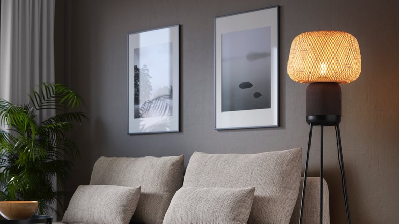 The IKEA Symfonisk floor lamp in a modern living room.
