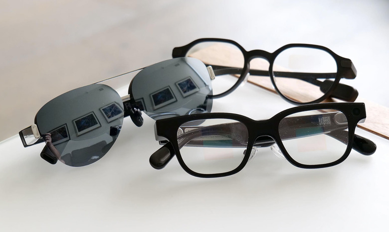 A trio of various smart glasses.