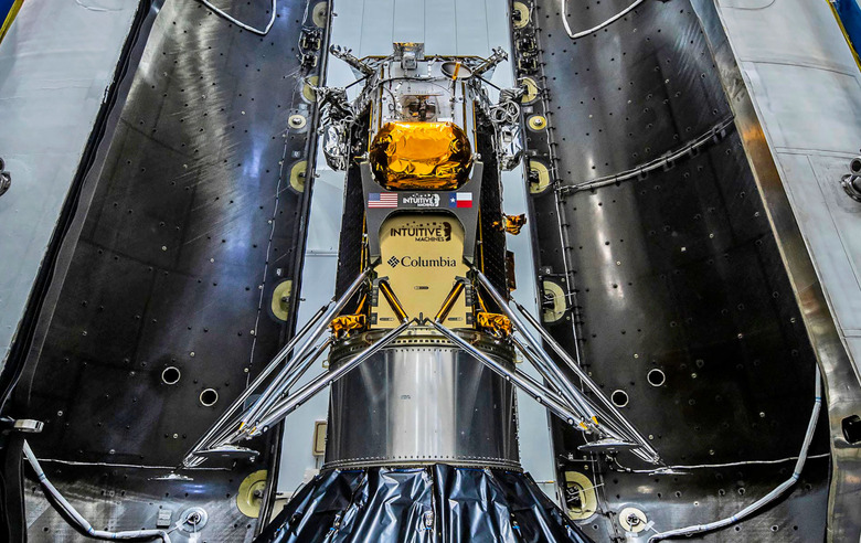 A silver space vessal marked 