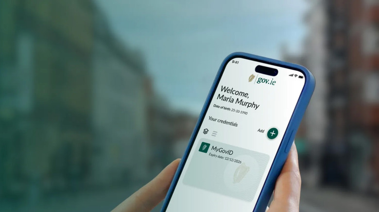 Someone holding a smartphone with Ireland's Government Digital Wallet open.