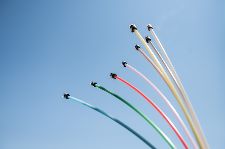 15 July 2024, Baden-Württemberg, Rottweil: Fiber optic cables with various connections protrude from the ground at a construction site near a residential area in Rottweil. Photo: Silas Stein/dpa (Photo by Silas Stein/picture alliance via Getty Images)