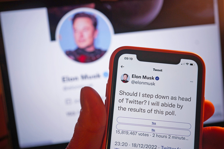 A phone being held showing the twitter poll on screen, in a home in London. Elon Musk looks set to step down from the top job at Twitter after just two months, if he respects the results of an online poll launched on Sunday night. Around 57% of 14 million voters had said that Mr Musk should resign as Twitter chief executive with around three hours to go until the poll closed. Picture date: Monday December 19, 2022. 
