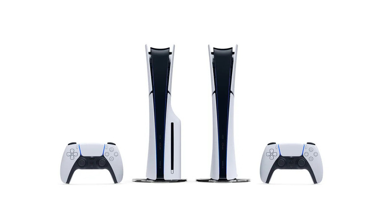 Two versions of the PlayStation 5 next to DualShock controllers