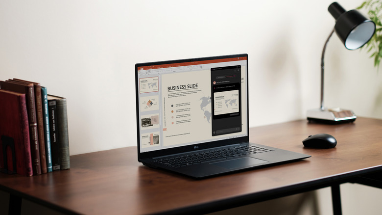 Product lifestyle image of the LG Gram Pro, sitting on an office desk.