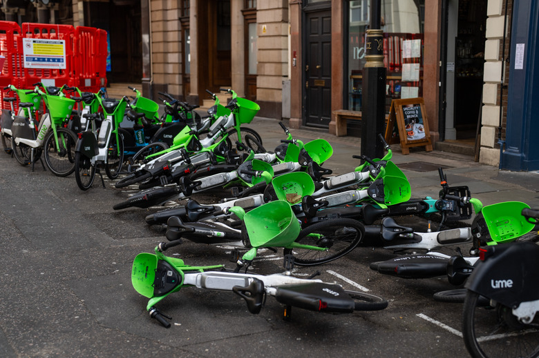 LONDON, ENGLAND - MARCH 27: Lime bikes lay in the road on March 27, 2024 in London, United Kingdom. (Photo by Carl Court/Getty Images)