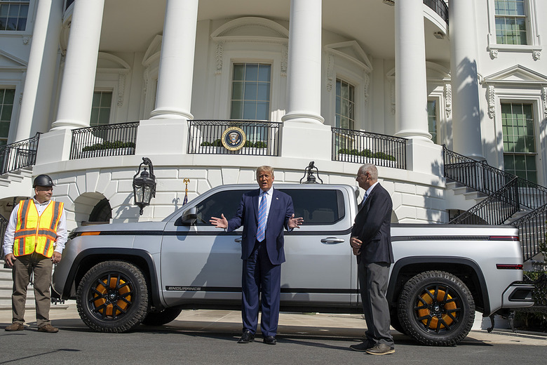 WASHINGTON, DC - SEPTEMBER 28: U.S. President Donald Trump chats with Steve Burns Lordstown Motors CEO about the new Endurance all-electric pickup truck on the south lawn of the White House on September 28, 2020 in Washington, DC. They bought the old GM Lordstown plant in Ohio to build the Endurance all-electric pickup truck, inside those four wheels are electric motors similar to electric scooters.  (Photo by Tasos Katopodis/Getty Images)