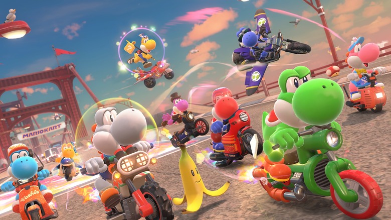 Several Yoshis of different colors race in Mario Kart World