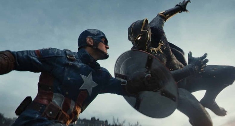 Captain America uses his shield to block an attacking Black Panther.