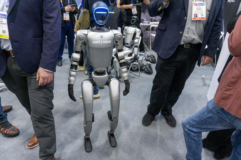 A Unitree humanoid robot on the floor of CES 2025.
