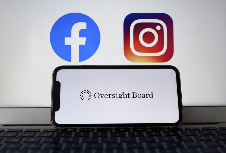  Oversight Board logo is seen on a smart phone with Facebook and Instagram logos at the background (Photo by Hakan Nural/Anadolu Agency via Getty Images)
