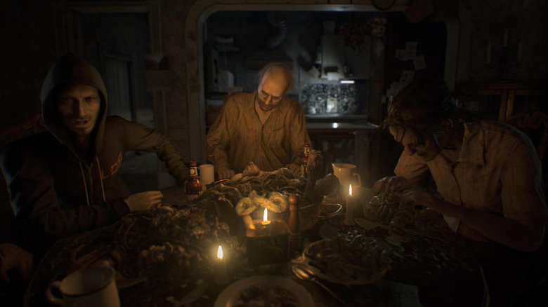 Screenshot from Resident Evil 7: dark setting, creepy figures stand around a creepy candle-lit table.