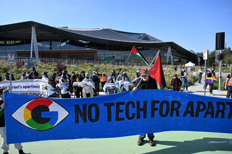 MOUNTAIN VIEW, CALIFORNIA - MAY 14: Pro-Palestinian protesters are blocked the Google I/O developer conference entrance to protest Google's Project Nimbus and Israeli attacks on Gaza and Rafah, at its headquarters in Mountain View, California, United States on May 14, 2024. Project Nimbus is a cloud computing project of the Israeli government and its military. (Photo by Tayfun Coskun/Anadolu via Getty Images)