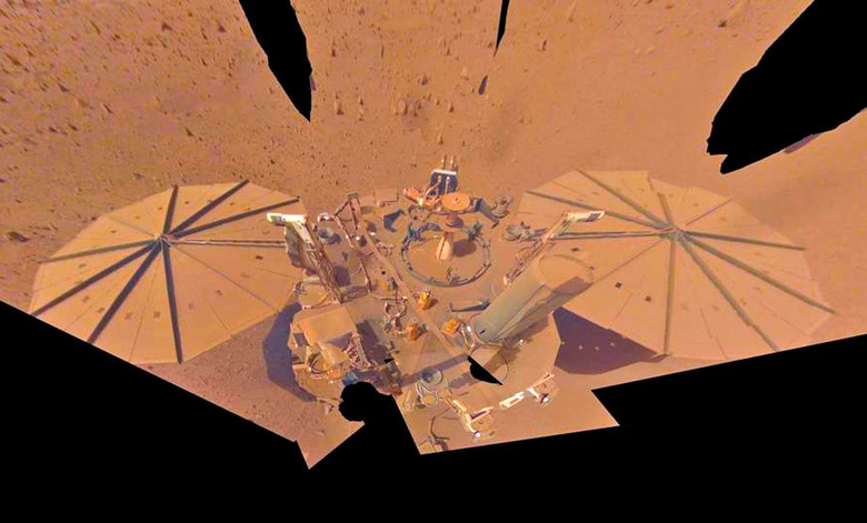 A selfi-image taken by the NASA InSight lander, showing itself cobbled together from a variety of slightly skewed angles.