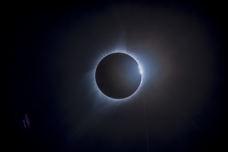 A total solar eclipse is seen on Monday, Aug. 21, 2017 above Jefferson City, Missouri. A total solar eclipse swept across a narrow portion of the contiguous United States from Lincoln Beach, Oregon to Charleston, South Carolina. A partial solar eclipse was visible across the entire North American continent along with parts of South America, Africa, and Europe.  Photo Credit: (NASA/Rami Daud) 