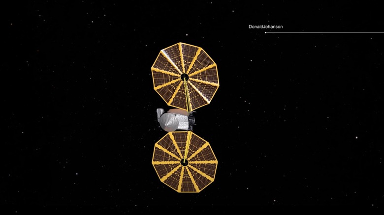 A graphic showing the Lucy spacecraft and the path of the approaching Donaldjohanson asteroid