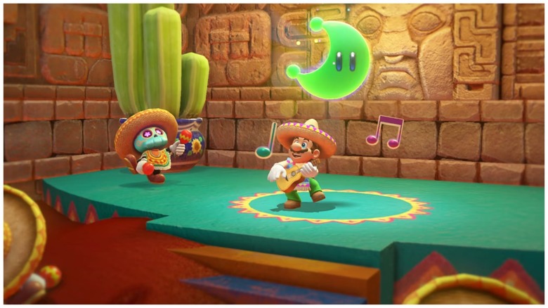 Mario playing guitar while wearing a sombrero. A green power moon floats above his head.