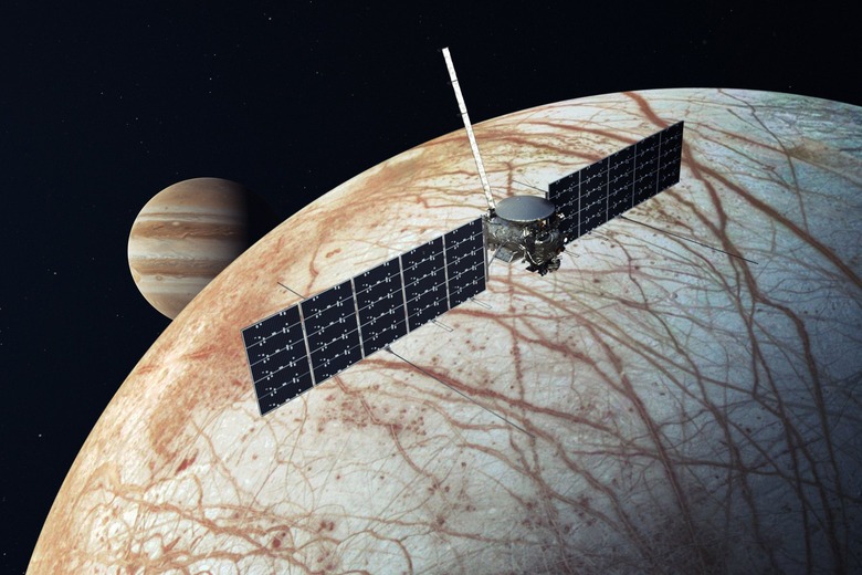An artist's impression of the Europa clipper in front of Jupiter's moon Europa