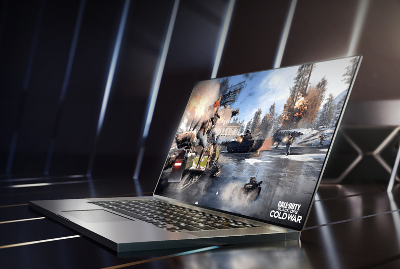 A laptop with a video game on its screen.