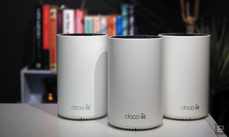 Image of three Deco 6E modules on a white table in front of a bookshelf.