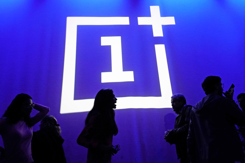 The OnePlus logo is projected onto a wall during a launch event for the new OnePlus 6T in the Manhattan borough of New York, New York, U.S., October 29, 2018. 