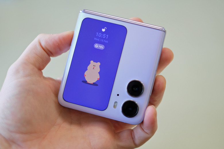 Image of the Find N2 Flip closed, showing the cover display featuring an animated hamster.