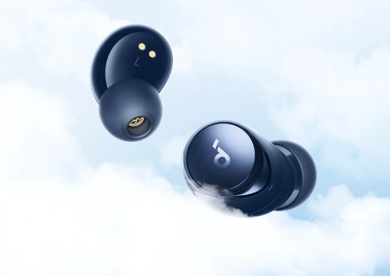 Some earbuds floating in the sky.