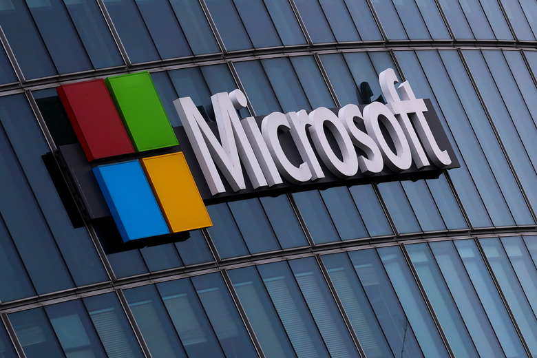 FILE PHOTO: A view shows a Microsoft logo at Microsoft offices in Issy-les-Moulineaux near Paris, France, March 21, 2025. REUTERS/Gonzalo Fuentes/ File Photo