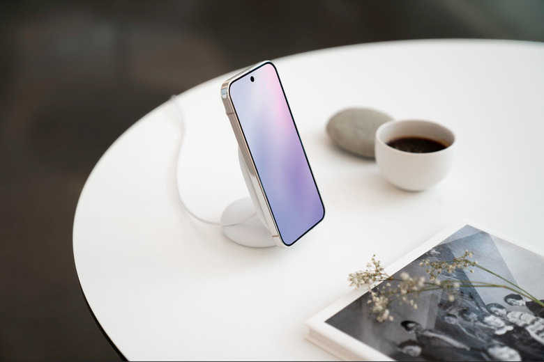 A phone on a charger.