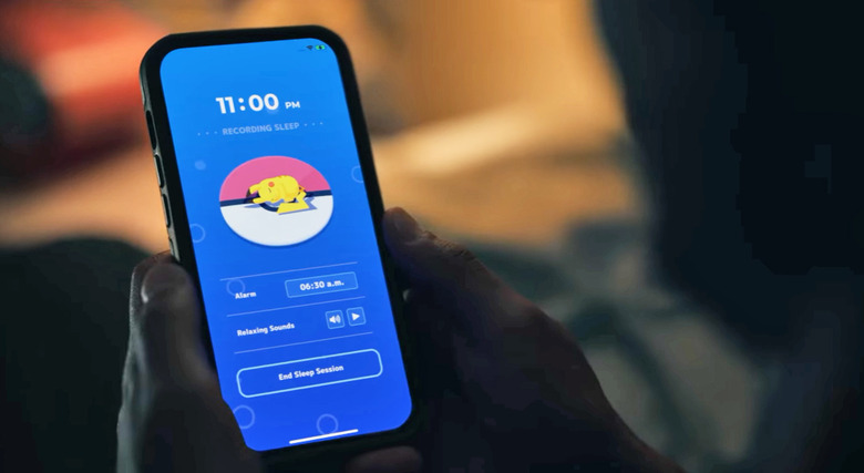 Pokémon Sleep app showing a time of 11PM and a sleeping Pikachu.