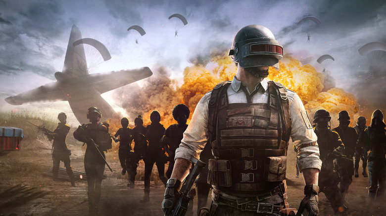 Cover art for PUBG. Person in a visor helmet in front of a bunch of shadowy soldiers. A plane crashing in the background.